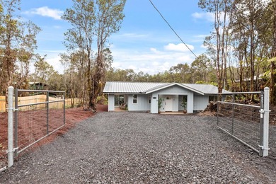 Tucked away on a quiet dead-end road in Mauna Loa Estates, this - photo 3