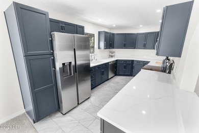 AWESOME UPDATED HANGAR POOL HOME FEATURING 3 EN-SUITE BEDROOMS & - photo 8