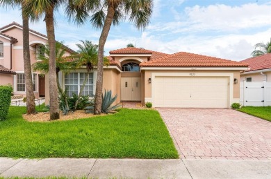 Lake Home Active Under Con in Boca Raton, Florida