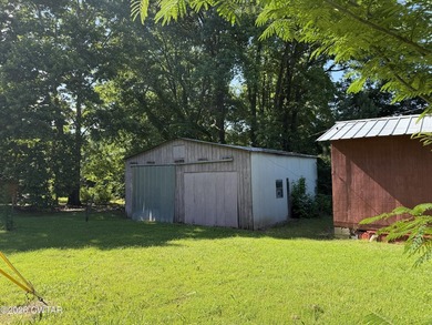 Check out this 3 bedroom, ranch-style home with a barn, shop - photo 11