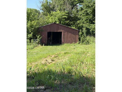 Check out this 3 bedroom, ranch-style home with a barn, shop - photo 14