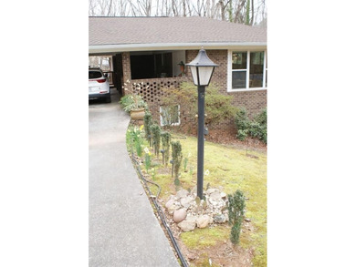 Welcome home to this beautiful, mid-century modern, 4-sided