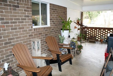 Welcome home to this beautiful, mid-century modern, 4-sided