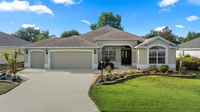 Stunning Gardenia Designer home with golf cart garage. Located - photo 1