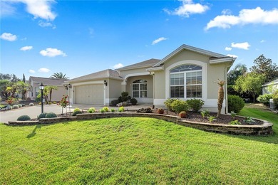 Stunning Gardenia Designer home with golf cart garage. Located - photo 2