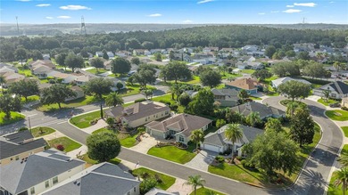 Stunning Gardenia Designer home with golf cart garage. Located - photo 6
