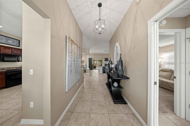 Stunning Gardenia Designer home with golf cart garage. Located - photo 8