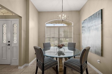 Stunning Gardenia Designer home with golf cart garage. Located - photo 9