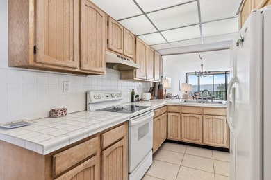 This spectacular condo with East/West orientation has completely - photo 3