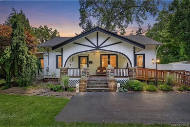 A rare waterfront gem! This beautifully reimagined 4-bedroom, 2 - photo 1