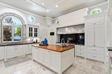 Tucked away on a private, tree-lined lane in Holladay, this - photo 15