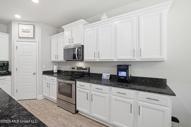 This home has it all! Featuring a spacious open floor plan, this - photo 17