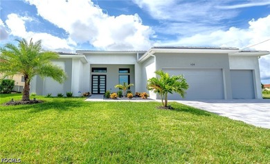 WELCOME TO THIS NEWLY BUILD LUXURY HOME BY THE WATER 3 Bed + Den - photo 1