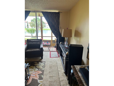 This charming first-floor condo at 2800 Sunrise Lakes Dr W - photo 4