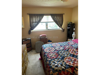 This charming first-floor condo at 2800 Sunrise Lakes Dr W - photo 9