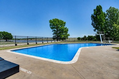Nestled on a beautiful lot with amazing water views, this - photo 1