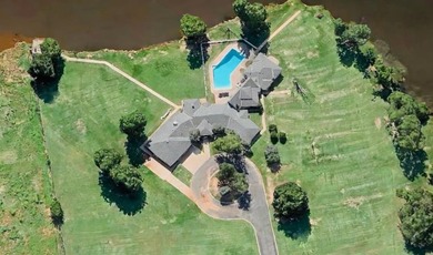 Nestled on a beautiful lot with amazing water views, this - photo 2