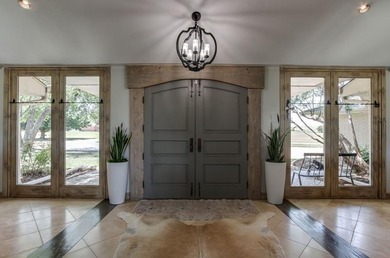 Nestled on a beautiful lot with amazing water views, this - photo 3