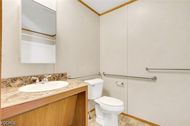 Situated on over half an acre, this pristine three-bedroom - photo 8