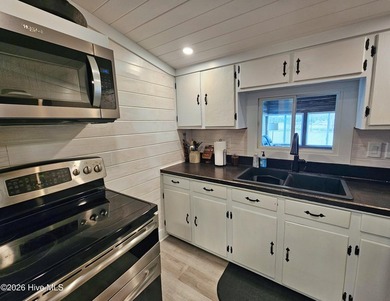 With 4+/- acres and nearly 1,000' of shoreline, this 3 bedroom - photo 22