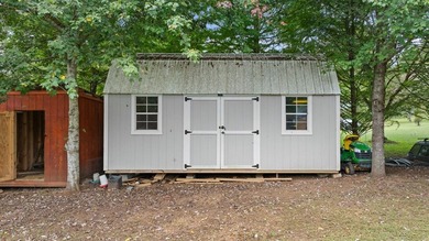 Beautiful setting with scenic views of Coweeta Lake on a full - photo 13