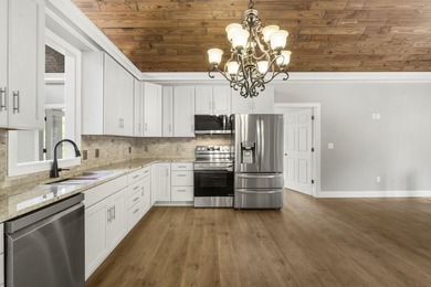 Brand-new construction home where luxury meets lake life just - photo 8
