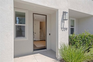 Rarely available, this exceptional 3-bedroom, 2.5-bath end-unit - photo 2
