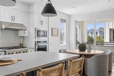 Rarely available, this exceptional 3-bedroom, 2.5-bath end-unit - photo 9