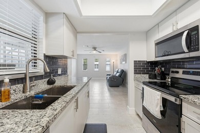Welcome to this freshly painted 2-bedroom, 2-bathroom pool home - photo 4