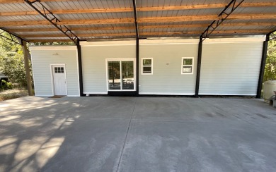 Lake Home For Sale in Lulu, Florida