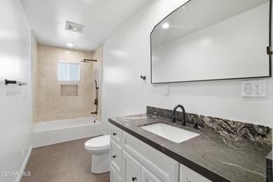 Beautifully remolded two-story home offering 4 bedrooms, 2 1/2 - photo 16