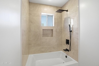 Beautifully remolded two-story home offering 4 bedrooms, 2 1/2 - photo 17