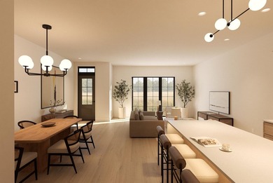 Experience elevated townhome living in downtown Goshen. The - photo 3