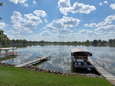 Immerse yourself in the beauty of lakefront living with this - photo 4