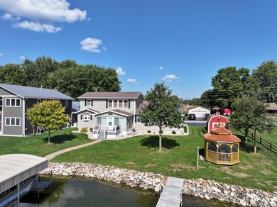 Immerse yourself in the beauty of lakefront living with this - photo 5