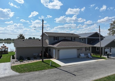 Immerse yourself in the beauty of lakefront living with this - photo 6