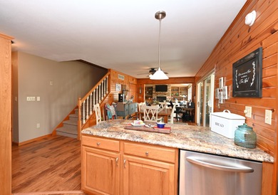 Immerse yourself in the beauty of lakefront living with this - photo 9