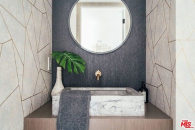 A refined coastal retreat awaits at this newly built modern - photo 11