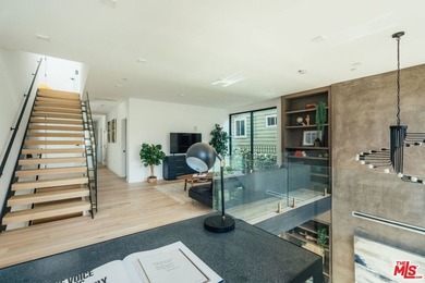 A refined coastal retreat awaits at this newly built modern - photo 13