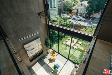 A refined coastal retreat awaits at this newly built modern - photo 14