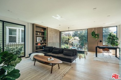 A refined coastal retreat awaits at this newly built modern - photo 15