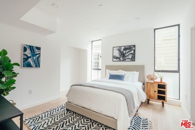 A refined coastal retreat awaits at this newly built modern - photo 20