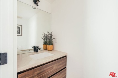 A refined coastal retreat awaits at this newly built modern - photo 28