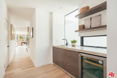 A refined coastal retreat awaits at this newly built modern - photo 29
