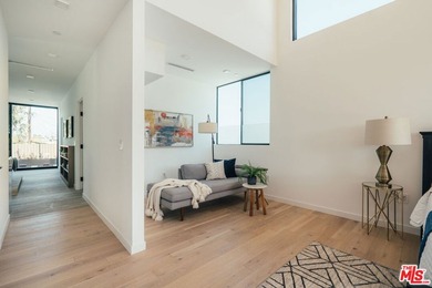 A refined coastal retreat awaits at this newly built modern - photo 32
