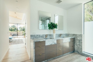 A refined coastal retreat awaits at this newly built modern - photo 34