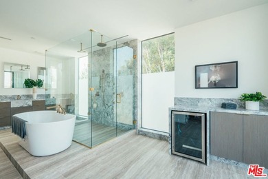 A refined coastal retreat awaits at this newly built modern - photo 35