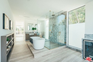 A refined coastal retreat awaits at this newly built modern - photo 36