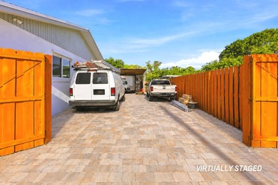 NO HOA! HUGE FULLY FENCED LOT WITH CIRCULAR PAVER DRIVEWAY - photo 6