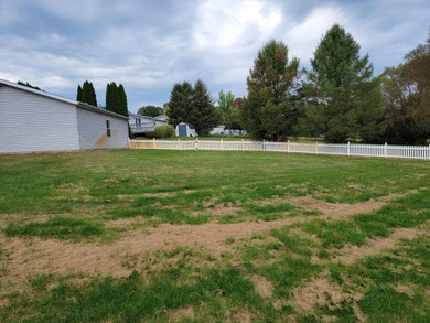 Welcome to 2027 E Coachlight Drive, a charming home nestled in